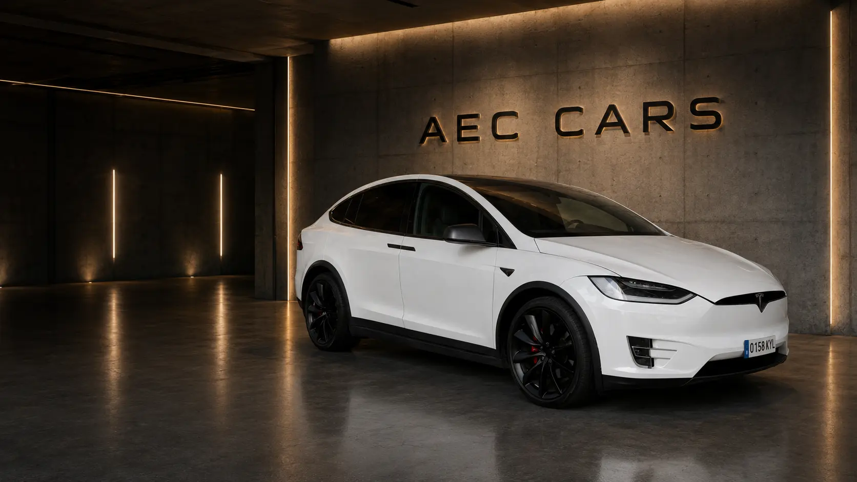 Tesla Model X en el espacio de hormigón de AEC Cars